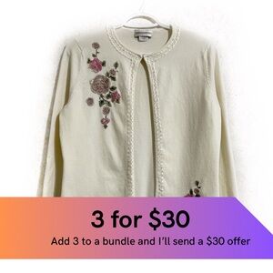 Embroidered and beaded vintage look open front cardigan.